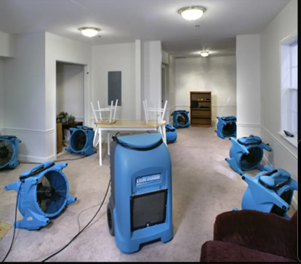Air movers and dehumidifier setup for Water Damage Restoration in Lenox
